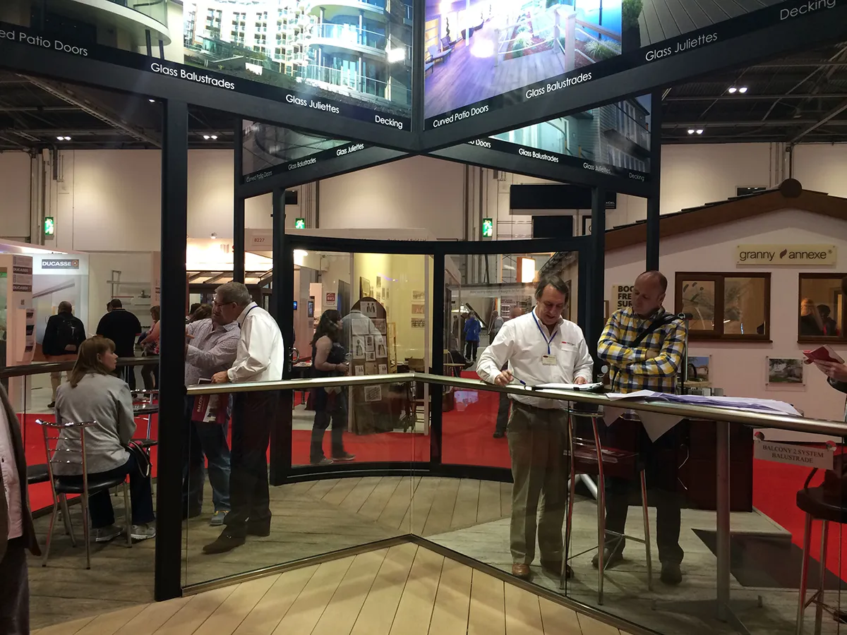 The Balconette team with a BalcoDeck® system at an exhibition